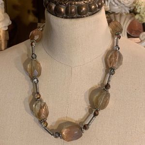 Heavy statement necklace with large shimmering stones